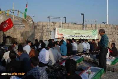 تجدید میثاق کارکنان و دانشجویان مرکز آموزش عا لی ثامن الحجج ( ع) مشهد با شهیدان انقلاب اسلامی درهفته دفاع مقدس