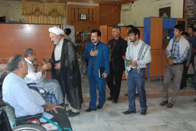 حضور  کارکنان ودانشجویان مرکز آموزش عالی ثامن الحجج ( ع) مشهددر آسایشگاه جانبازان و معلولین دفاع مقدس